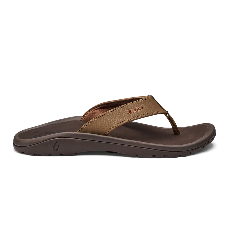 Brown sandal with 'Bacca Bucci' branding on a white background