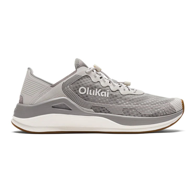 Gray running shoe with 'OluKai' branding on a white background
