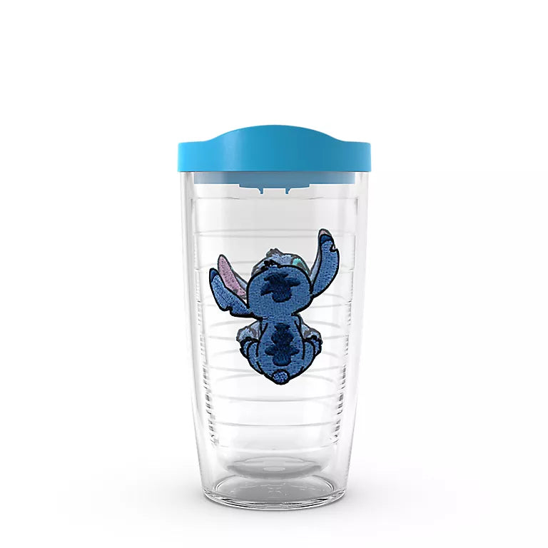 Clear tumbler with blue lid featuring a cartoon character on a white background