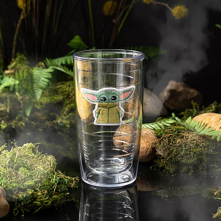 Clear tumbler with a character design on a natural background