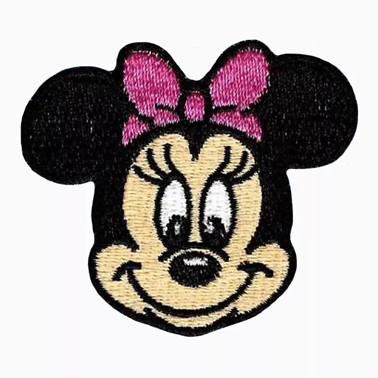 Embroidered patch of Minnie Mouse face with black ears and pink bow on a white background