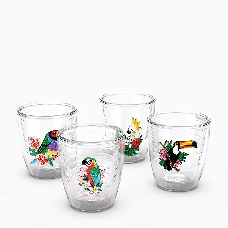 Set of four clear tumblers with colorful animal illustrations on a white background
