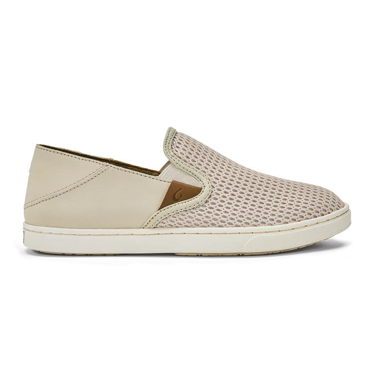 Beige slip-on shoe with mesh design on a white background