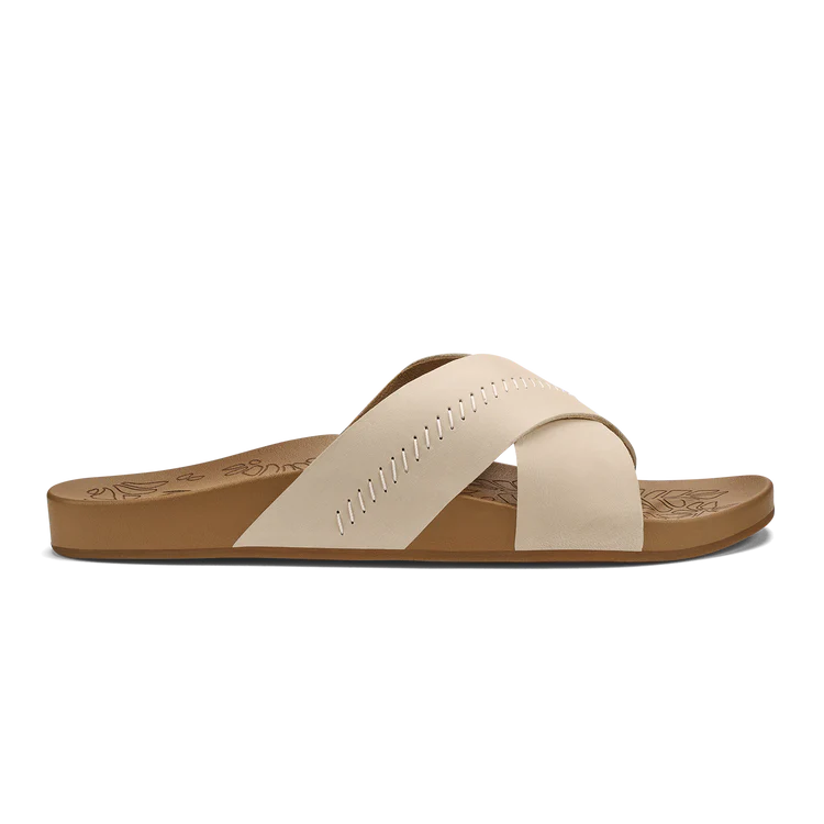 Beige sandal with a cross strap on a white background