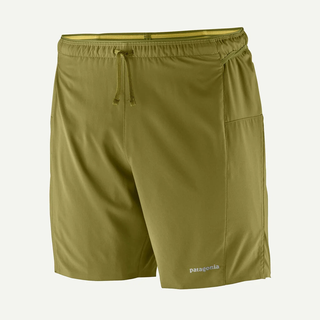 Green shorts with a drawstring on a white background
