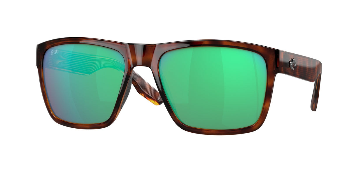 Sunglasses with tortoiseshell frame and green lenses on a white background
