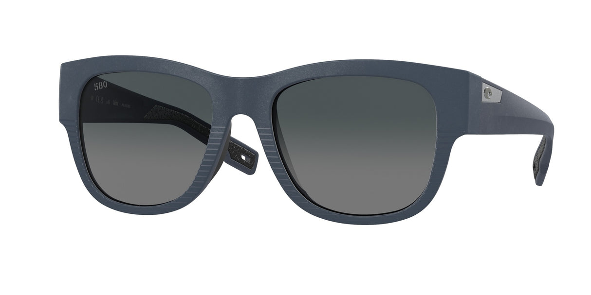 Blue sunglasses with a gradient lens on a white background