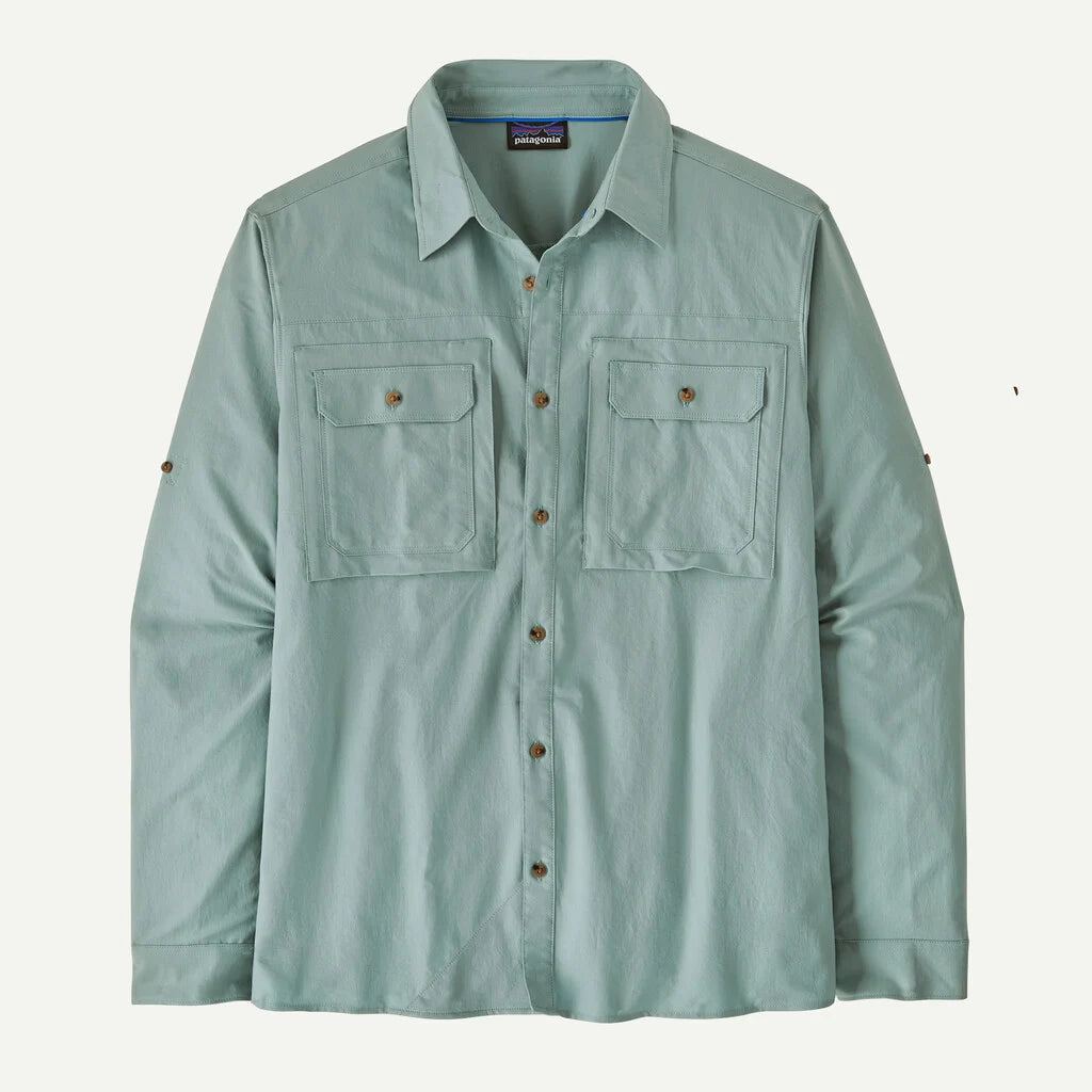 Light blue shirt with two chest pockets on a white background