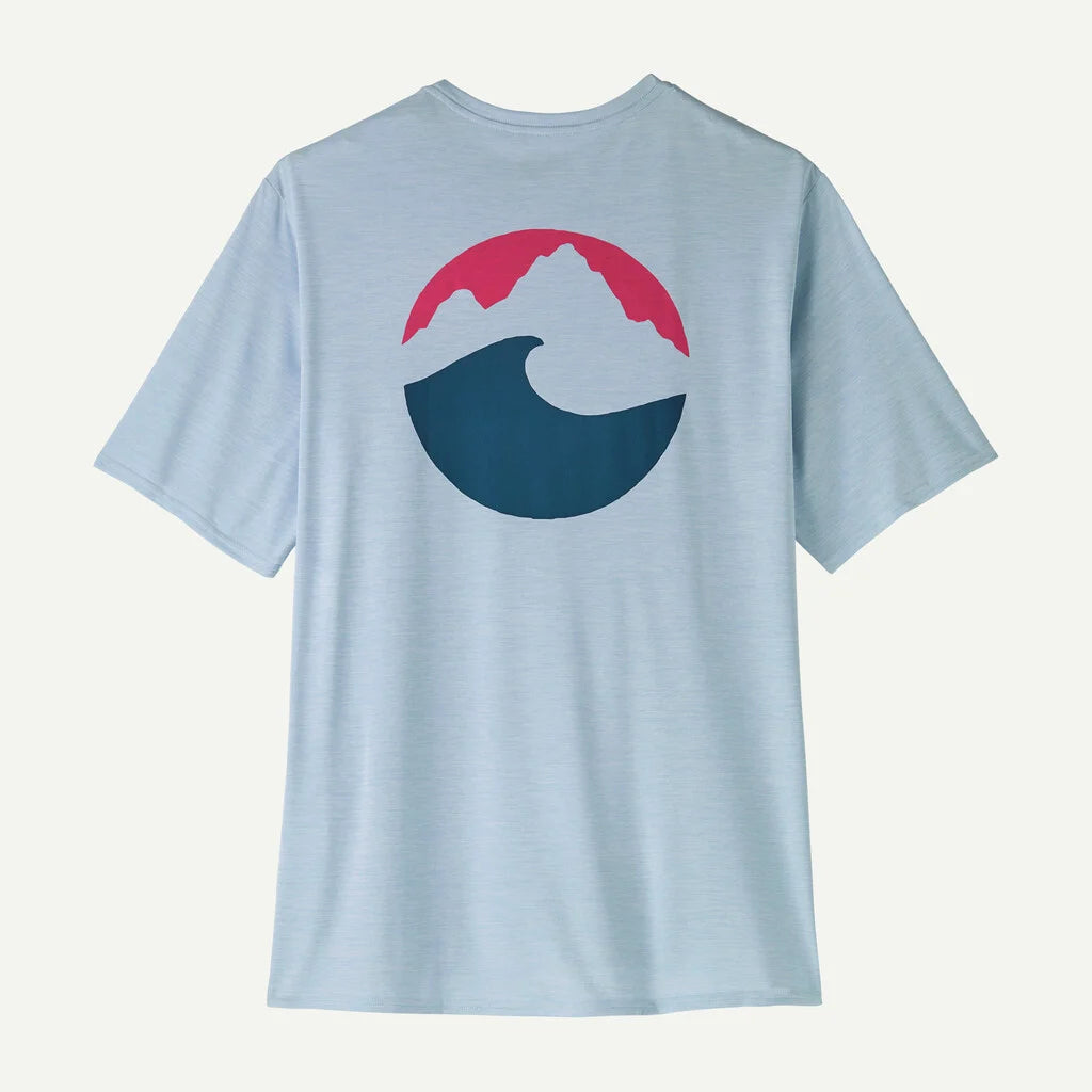Light blue t-shirt with a mountain and wave design on the back against a white background