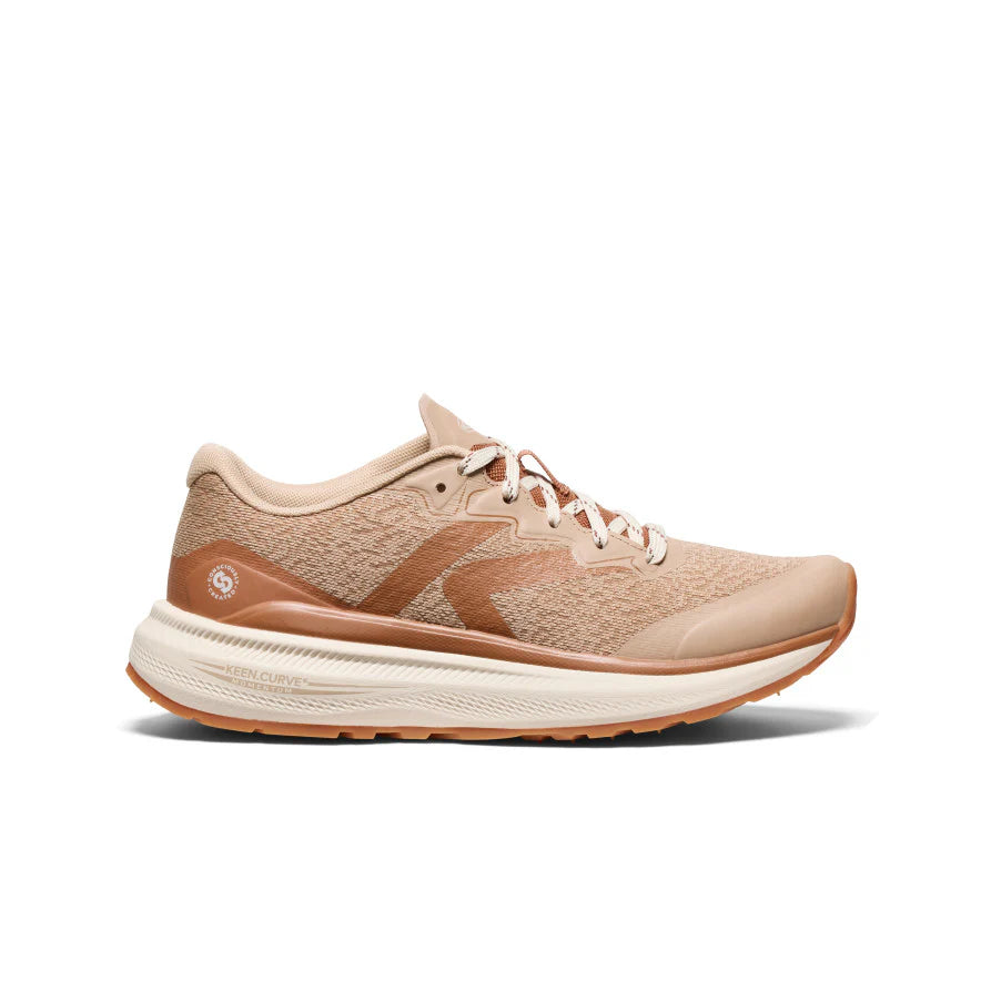 Beige running shoe on a white background