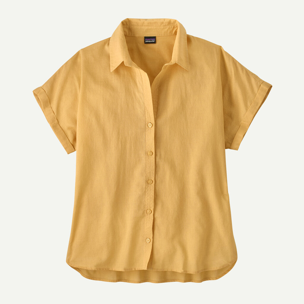 Yellow shirt with short sleeves on a light gray background