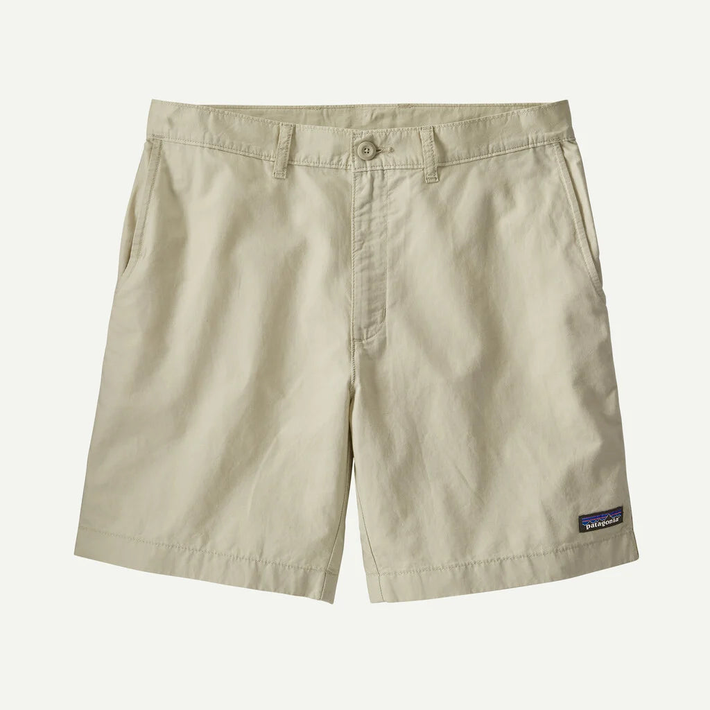 Beige shorts with a Patagonia logo on a light beige background