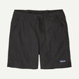 Black shorts with Patagonia logo on a light gray background