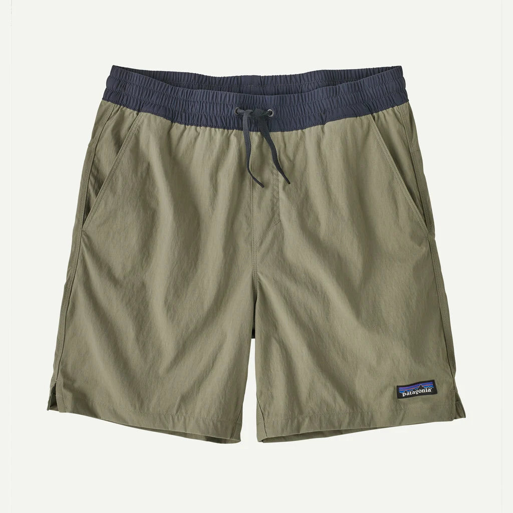 Olive green shorts with a navy waistband on a light gray background