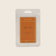 Aromatique Pumpkin Spice wax melt package on a beige background