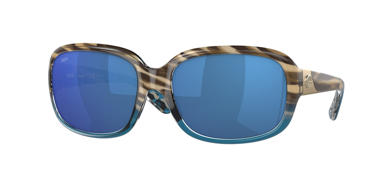 Sunglasses with blue lenses and tortoiseshell frame on a white background