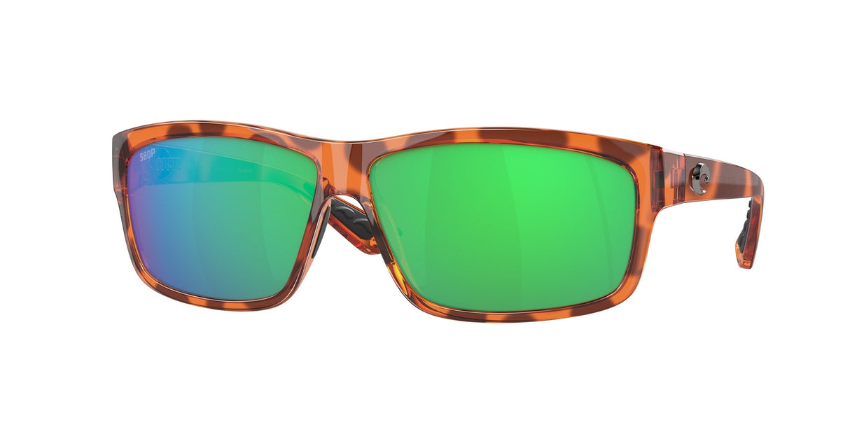 Sunglasses with tortoiseshell frame and green lenses on a white background