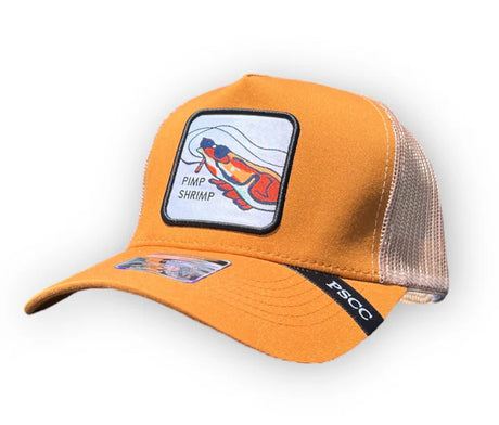 Orange trucker hat with a graphic patch on a white background
