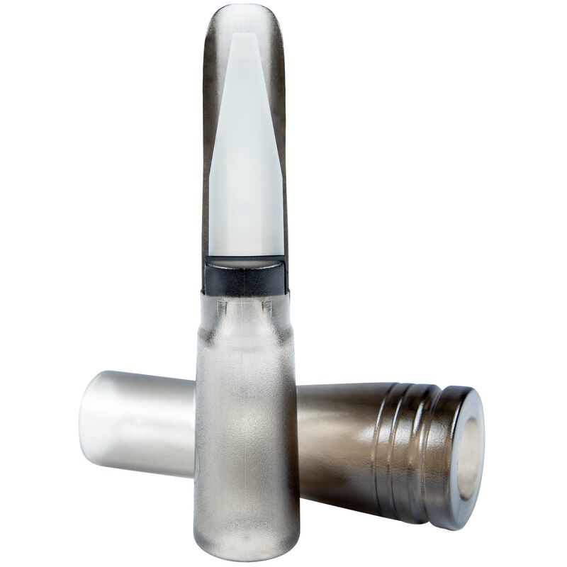 Metallic duck call for a wind instrument on a white background