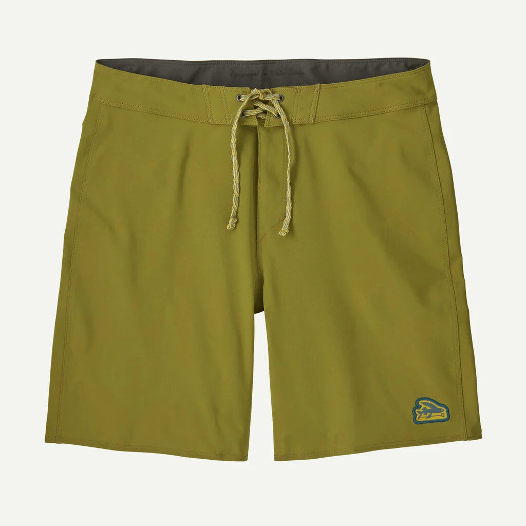 Green shorts with a drawstring on a light gray background