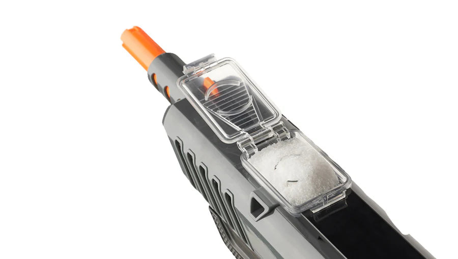 Close-up of a bug gun with an orange eraser on a white background