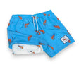 Blue swim shorts with orange lobster pattern on a white background