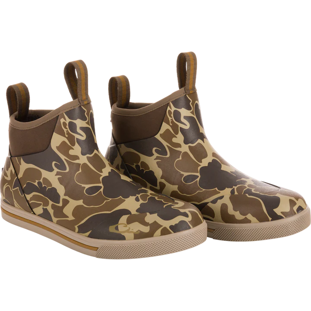 Camouflage-patterned boots on a white background