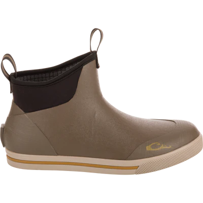Brown rubber boot with a visible brand logo on a white background