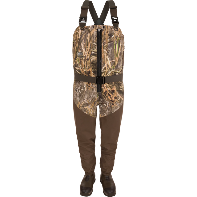 Camouflage hunting waders with suspenders on a white background