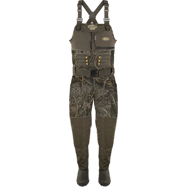 Camouflage hunting waders with suspenders on a white background