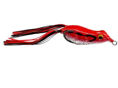 Red and black fishing lure on a white background