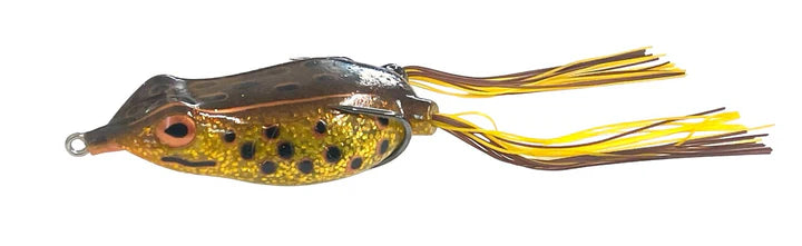 Fishing lure shaped like a frog with a gold and black pattern on a white background