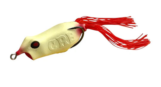 Gold and red fishing lure with 'C.R. B.' branding on a white background