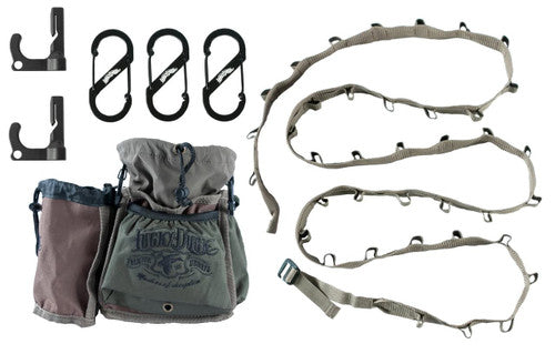 Set of climbing gear including carabiners, a harness, and ropes on a white background