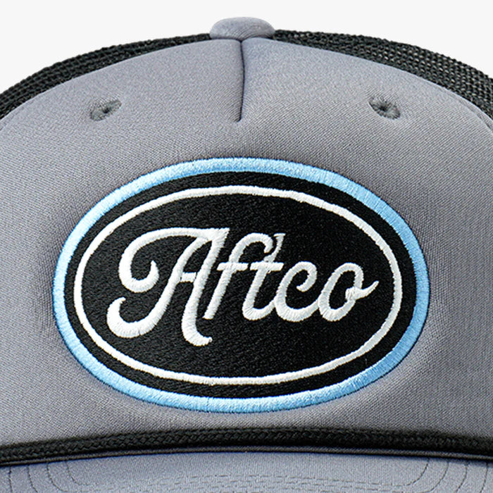 Gray cap with Aftco logo on a white background