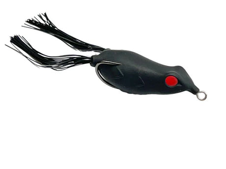 Black fishing lure with red eye and white treble hook on a white background