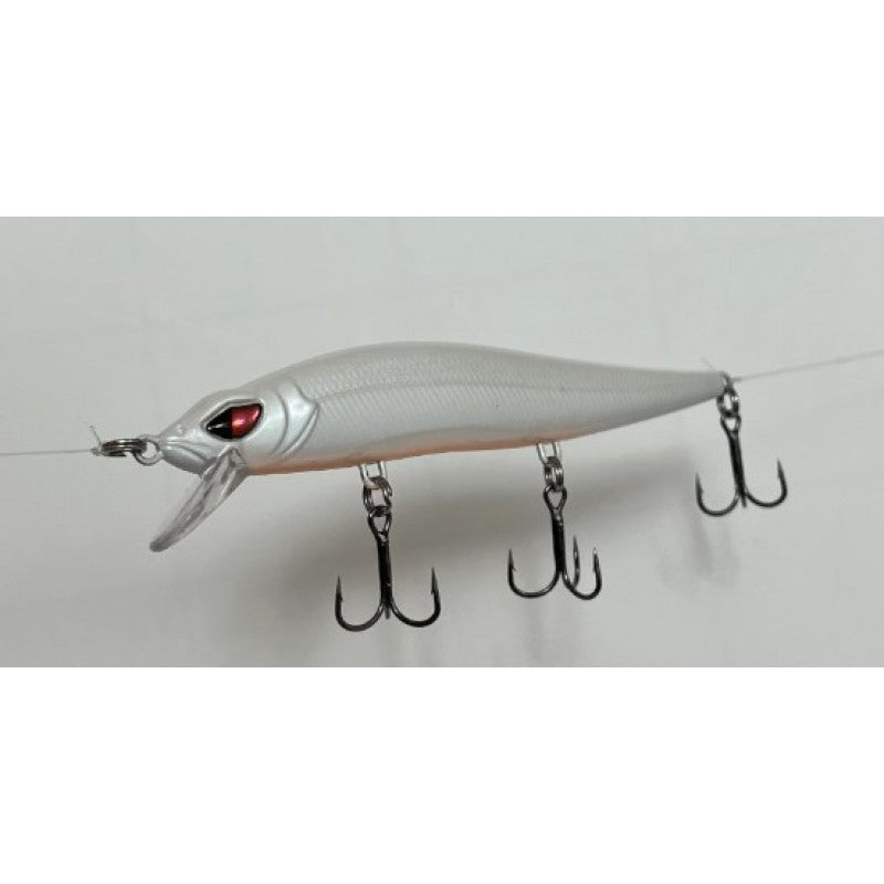 Fishing lure with multiple hooks on a gray background