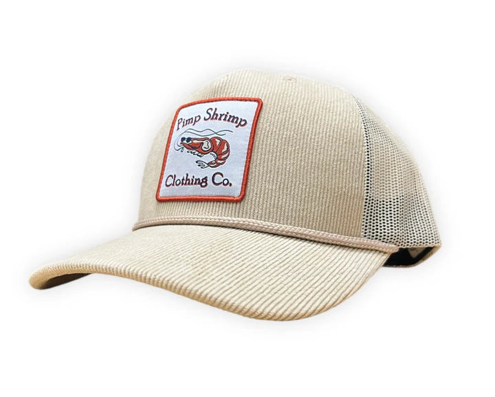 Beige cap with a patch on a white background