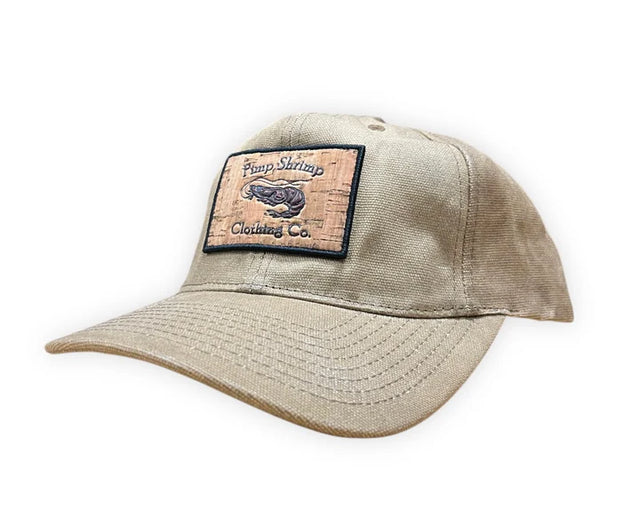 Beige cap with a patch on a white background