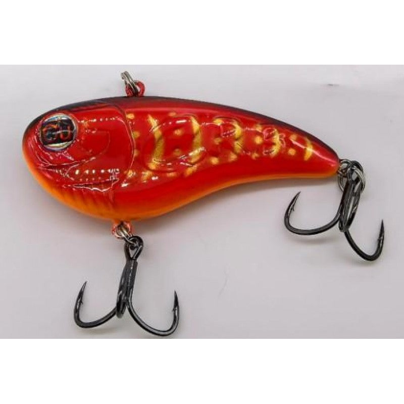 Red and orange fishing lure with black hooks on a white background