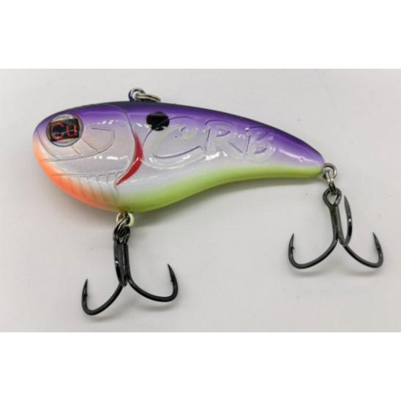 Colorful fishing lure with multiple hooks on a white background