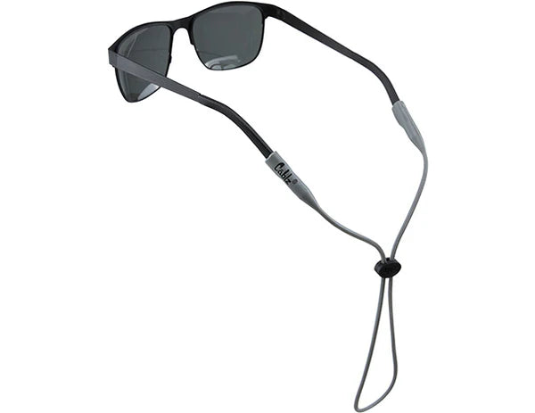 Sunglasses with a black cord on a white background