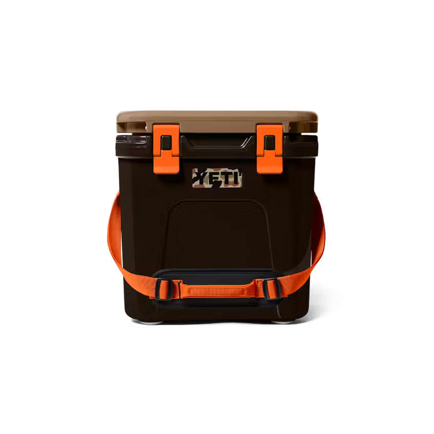 Black and orange cooler with 'YETI' logo on a white background