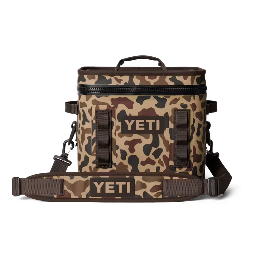 Camouflage-patterned YETI cooler bag on a white background