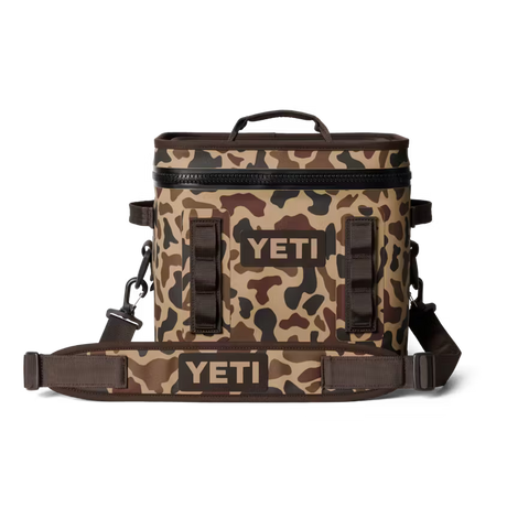 Camouflage-patterned YETI cooler bag on a white background