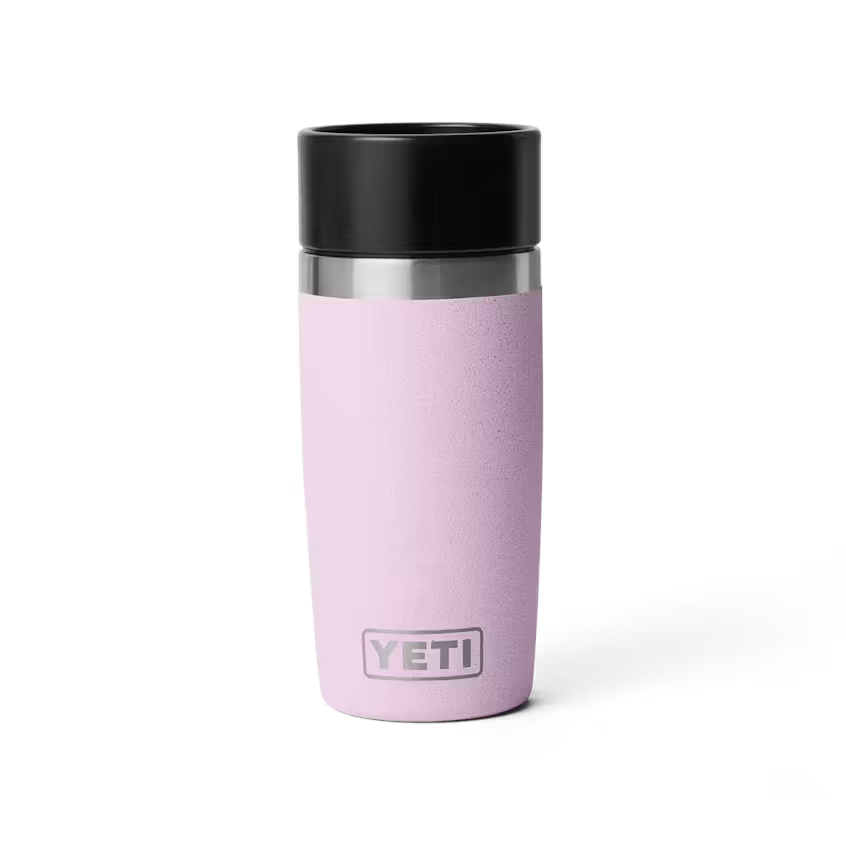 Pink YETI mug with black lid on a white background