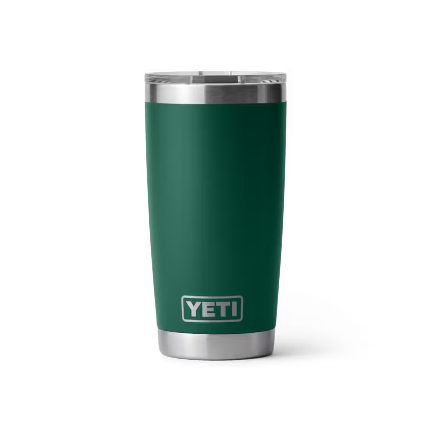 Green YETI tumbler with silver lid on a white background