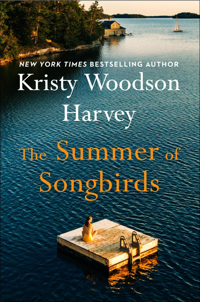 Book cover of 'The Summer of Songbirds' by Kristy Woodson Harvey with a scenic view of a lake and dock.
