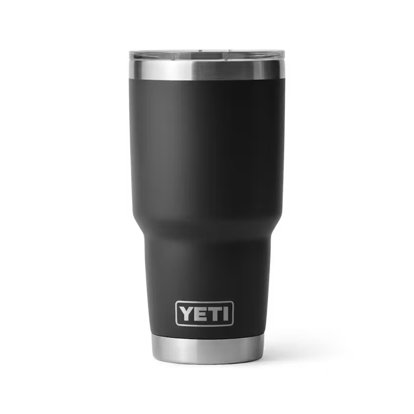 Black YETI tumbler with silver lid on a white background