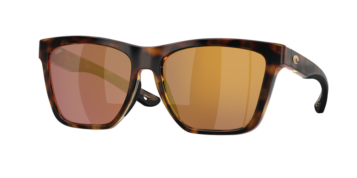 Tortoiseshell sunglasses with brown lenses on a white background